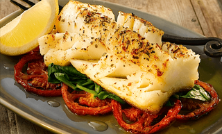 Lemon and Chilli Baked Fish with Roasted Tomatoes and Wilted Spinach